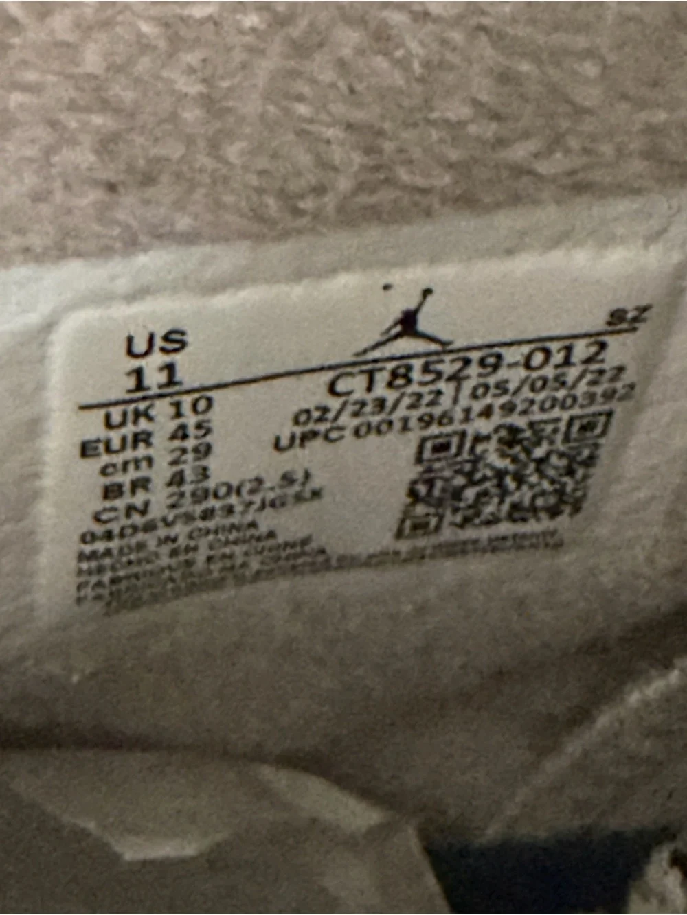 Jordan Retro High-Top Sneakers in Light Grey with Navy Accents